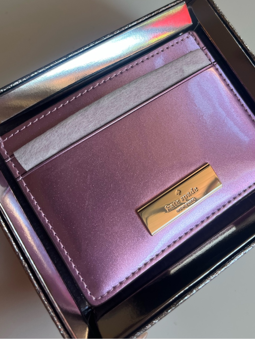kate spade metallic mauve cardholder with gold logo